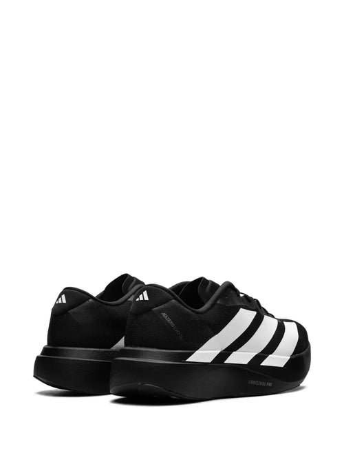 Adidas Adizero Evo SL en coloris noir et blanc avec une semelle épaisse