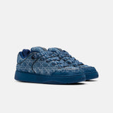 Christian Dior B9S Skater en denim bleu avec le motif Kumo Cannage.