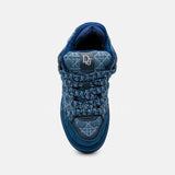 Christian Dior B9S Skater en denim bleu avec le motif Kumo Cannage.
